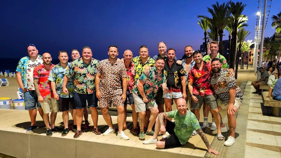 lads in clourful hawaian shirts